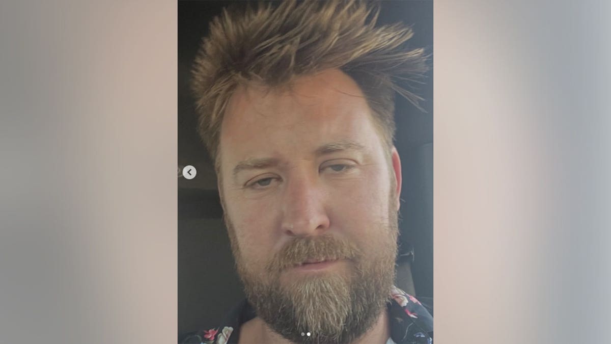 Charles Kelley looking into the camera looking dazed.