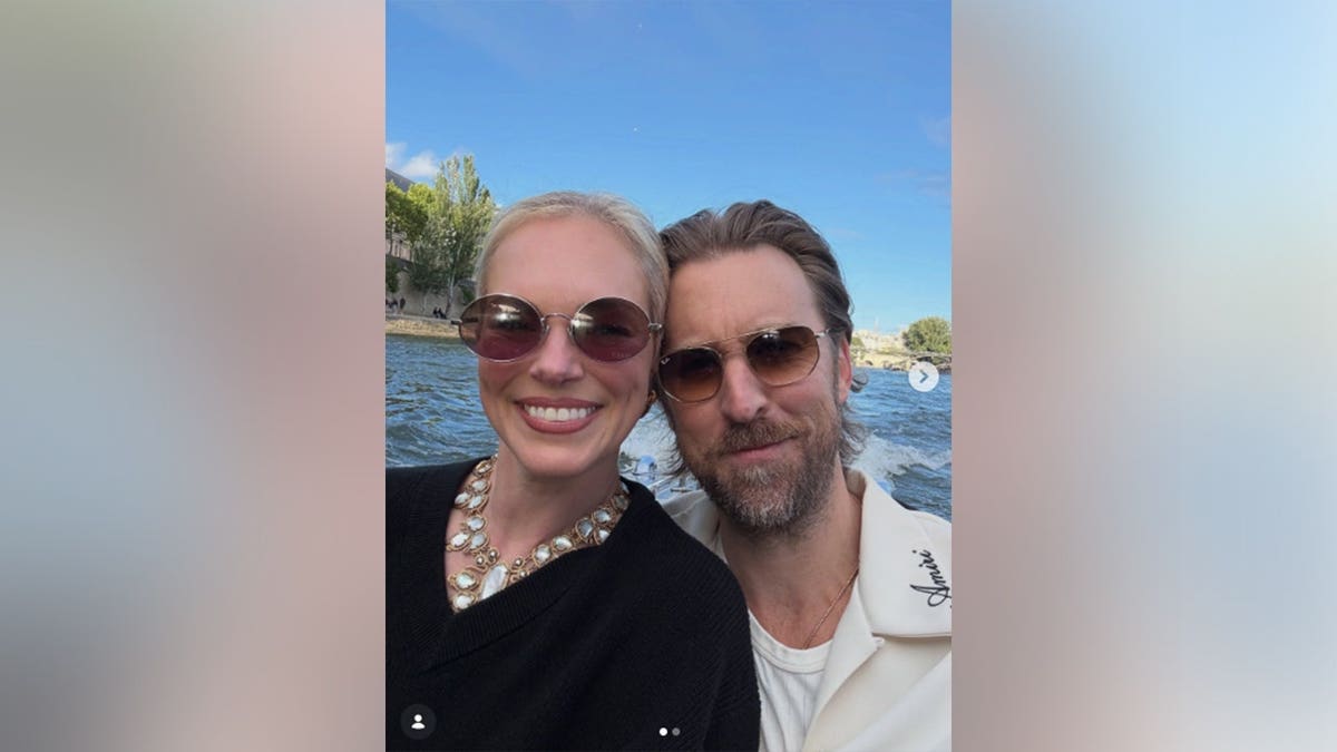 Charles Kelley and his wife Cassie posing while on the water.