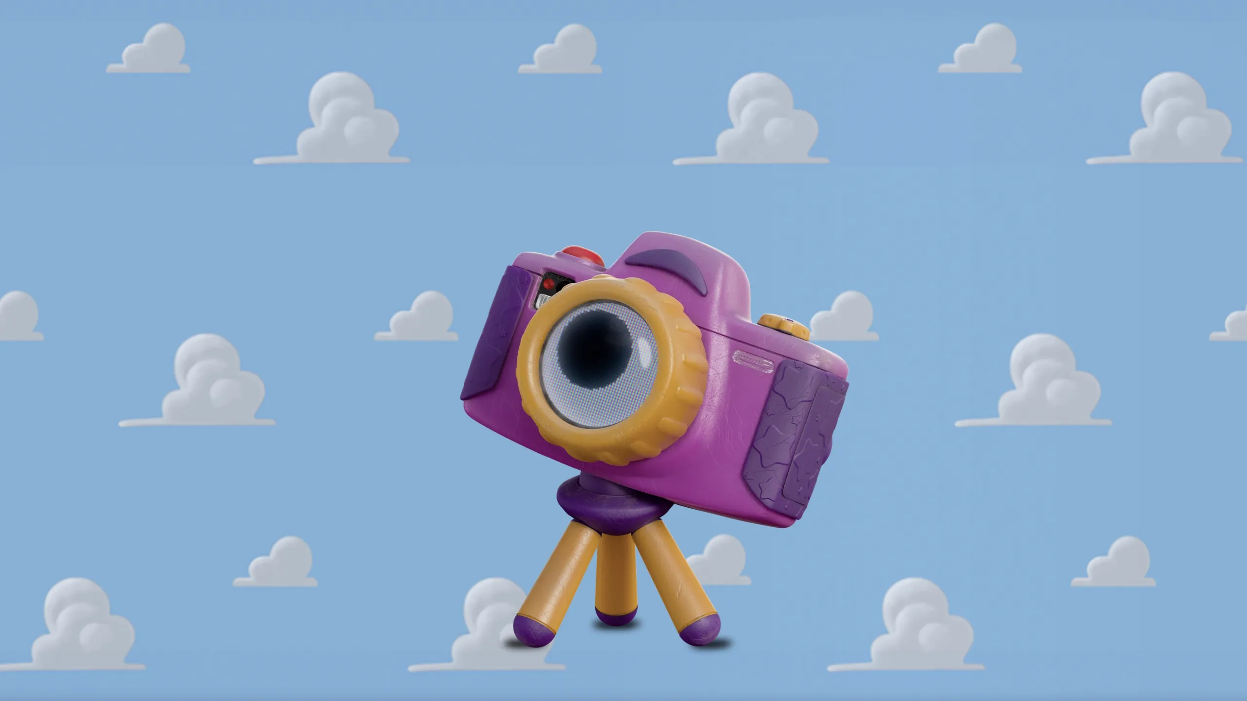 A pink and purple toy camera on a tripod