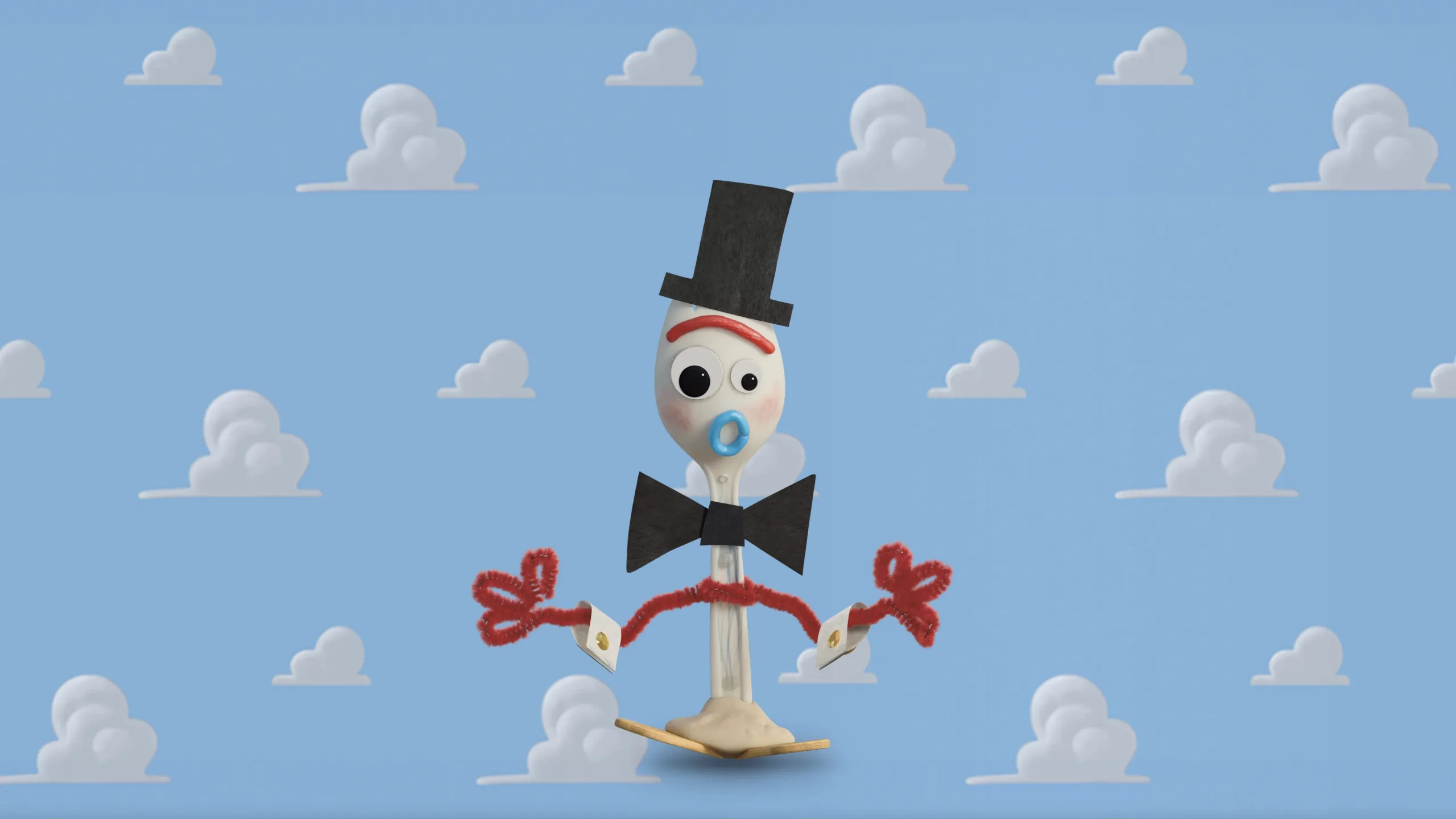 Forky, a homemade toy made from a spork and pipe cleaners, dressed in a bow tie and top hat