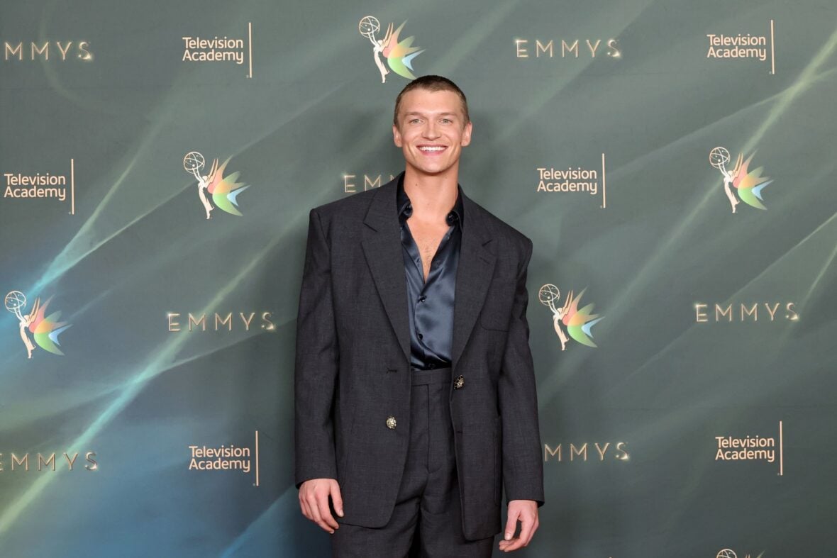 Connor Storrie poses on the red carpet at the Creative Arts Emmy Awards night two