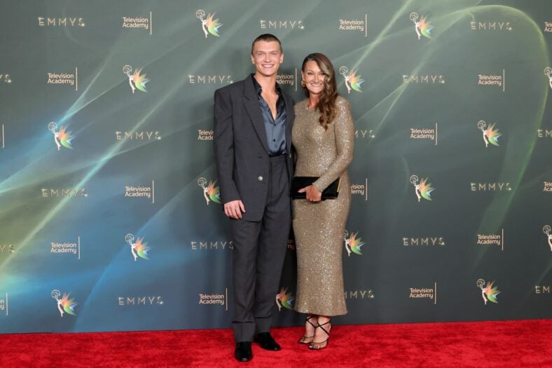 Connor Storrie and mom Linda pose on the red carpet at night two of the Creative Arts Emmy Awards