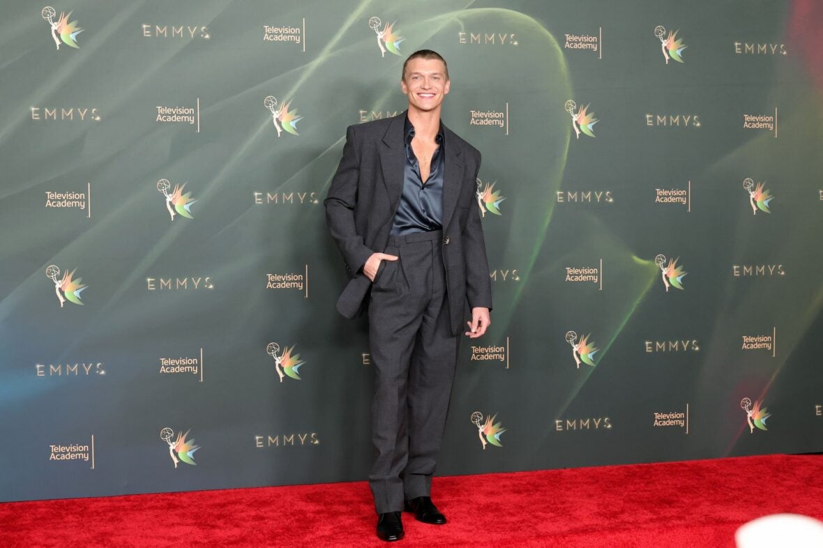 Connor Storrie poses on the red carpet at the Creative Arts Emmy Awards night two