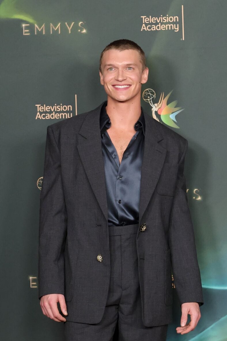 Connor Storrie poses on the red carpet at the Creative Arts Emmy Awards night two