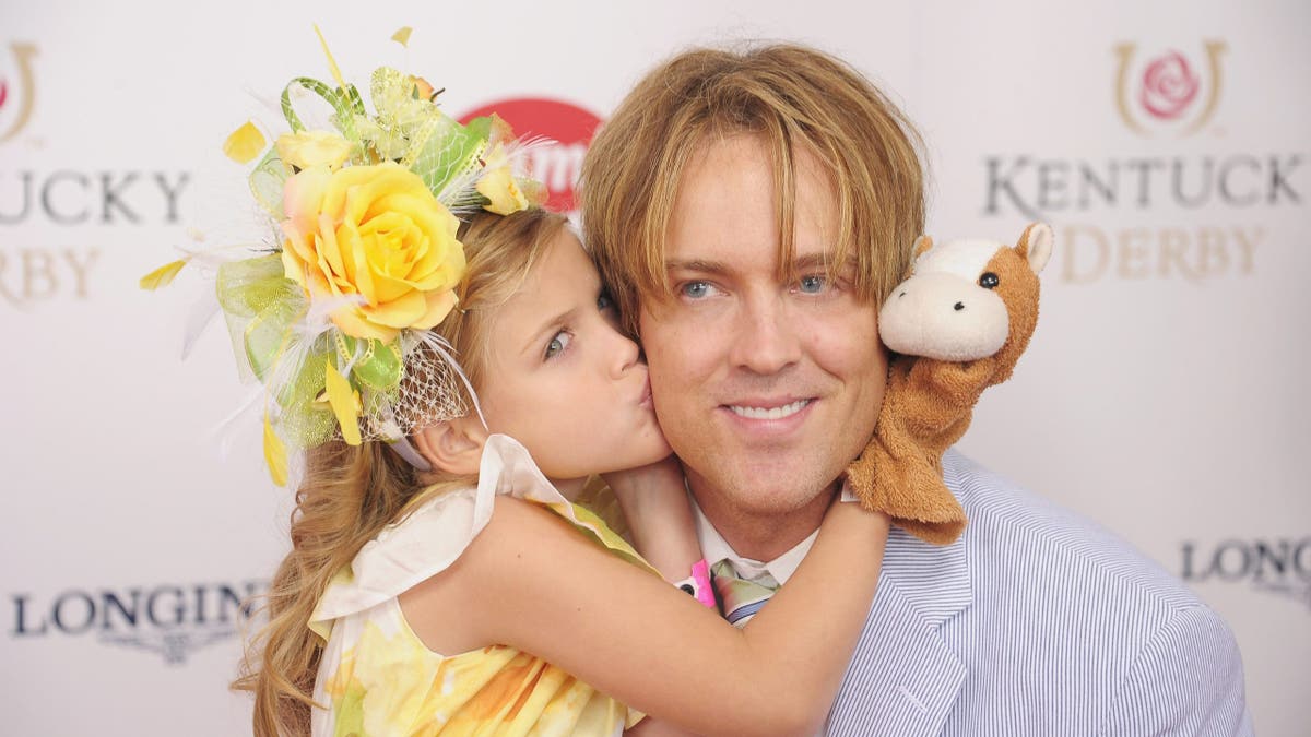 Dannielynn Birkhead and her father Larry Birkhead attend the Kentucky Derby at Churchill Downs.