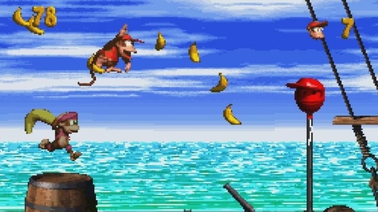 Diddy Kong and Dixie Kong jump through the air gathering bananas in Donkey Kong Country 2: Diddy's Kong Quest