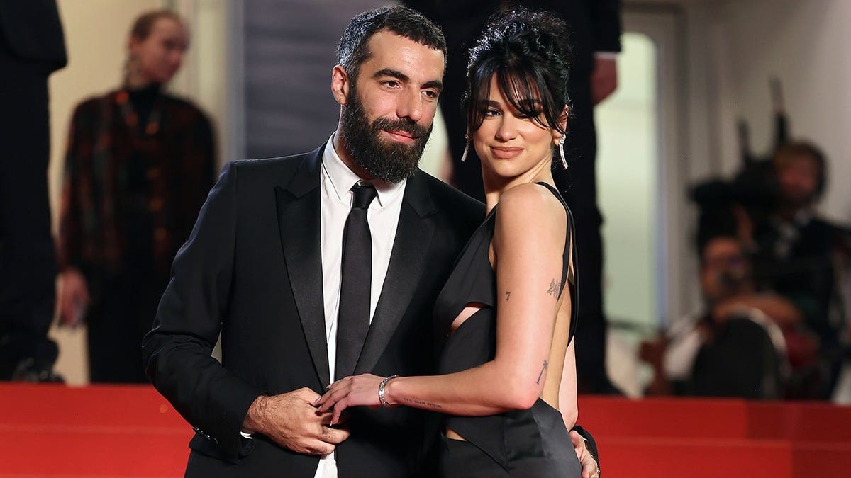 Dua Lipa and Romain Gavras at the "Omar La Fraise (The King of Algiers)" premiere at the Cannes Film Festival in May 2023.