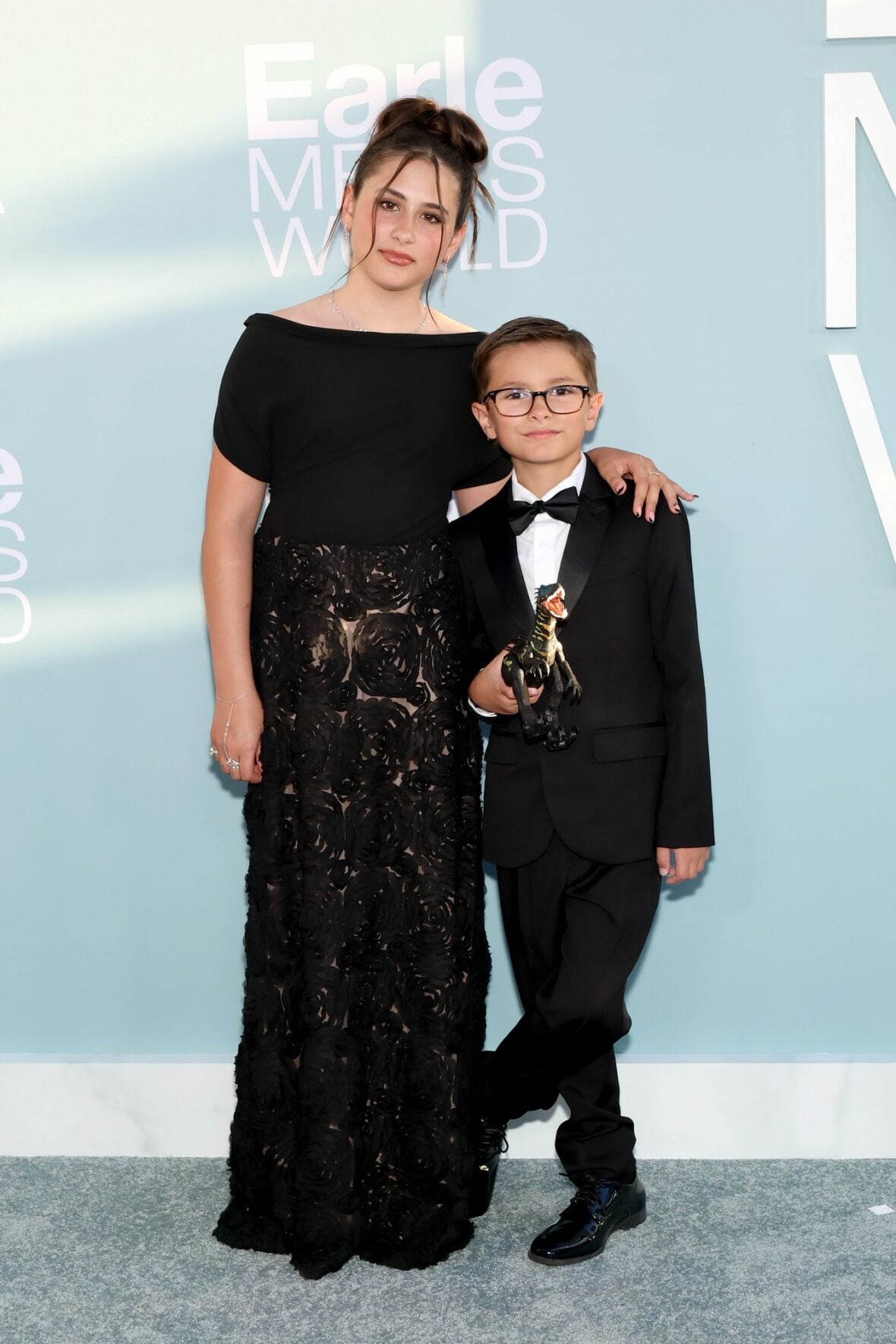 Penelope and Thomas Earle pose while attending the premiere of Earle Meets World