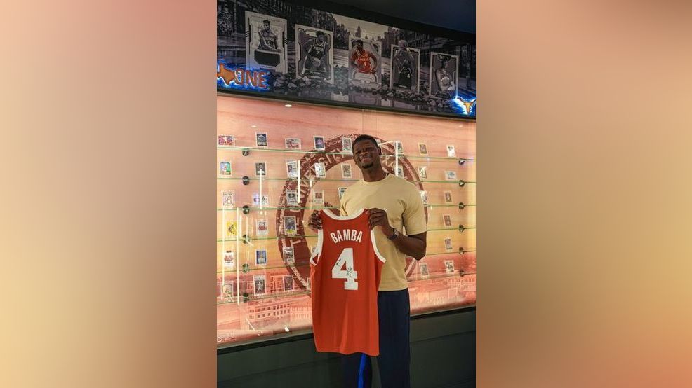 Mo with UT jersey.jpeg