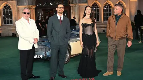 Getty Images LONDON, ENGLAND - SEPTEMBER 02: (L to R) Ray Winstone, Theo James, Kaya Scodelario and Guy Ritchie attend the World Premiere of "The Gentlemen" Season Two at Guildhall on September 2, 2026 in London, England. (Photo by Dave Benett/WireImage)