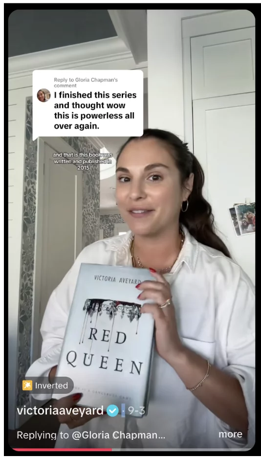 A screenshot of Victoria Aveyard using the 'reply to comment' feature in a TikTok video.