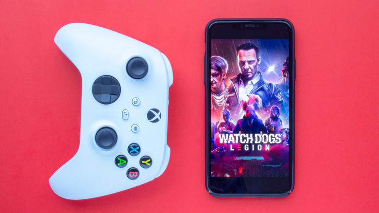 An iPhone and Xbox Wireless Controller
