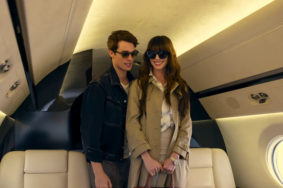 Nicholas Galitzine and Anne Hathaway in "The Idea of You."  A couple board a private jet.