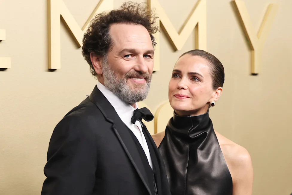 Matthew Rhys and Keri Russell smile for cameras at the 2026 Emmys.