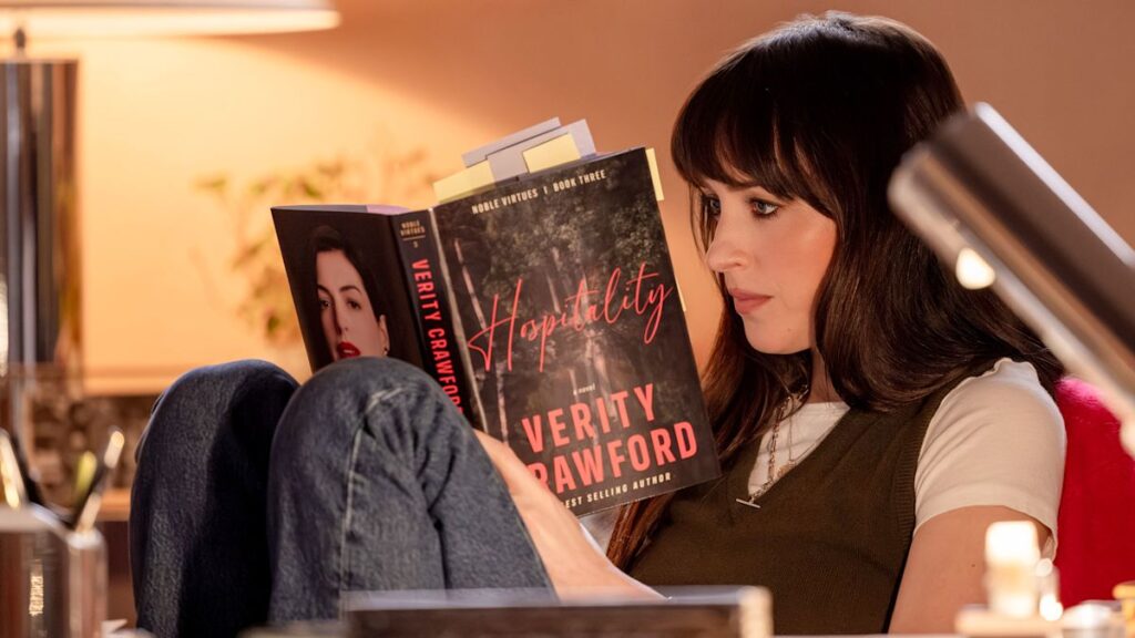 Behind the scenes of ‘Verity’: Anne Hathaway and Dakota Johnson on improvising a ‘sexy scene,’ that headboard bite and more