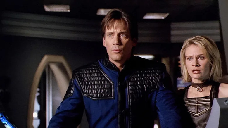 Dylan Hunt (Kevin Sorbo) and Beka (Lisa Ryder) standing next to each other on "Andromeda."