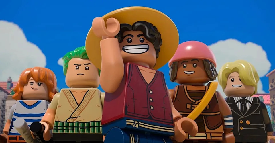 LEGO characters from "One Piece," including Luffy in a straw hat, Zoro, Nami, Usopp, and Sanji, standing together under a blue sky.
