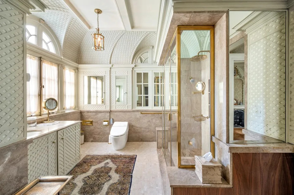 The home carries estimated monthly costs north of six figures including roughly $14,000 in property taxes alone. Carli Biryla