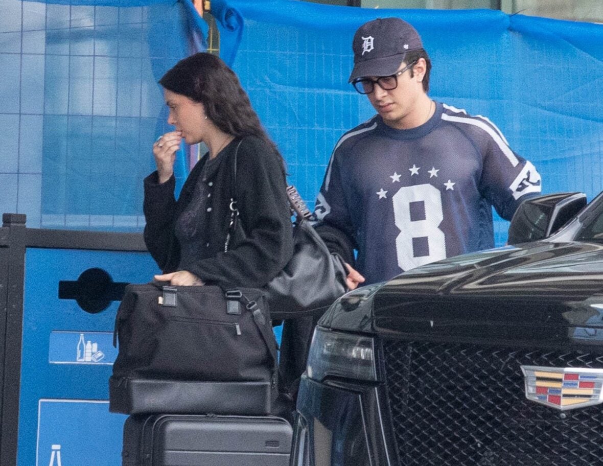 Hudson Williams and Katelyn Larson walking together in Toronto Airport