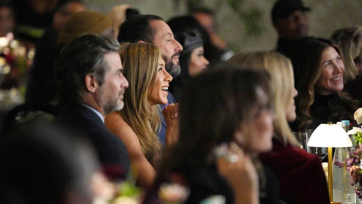 Jennifer Aniston, Jim Curtis, Adam Sandler and Jackie Sandler attend ELLE's Women in Hollywood Celebration.