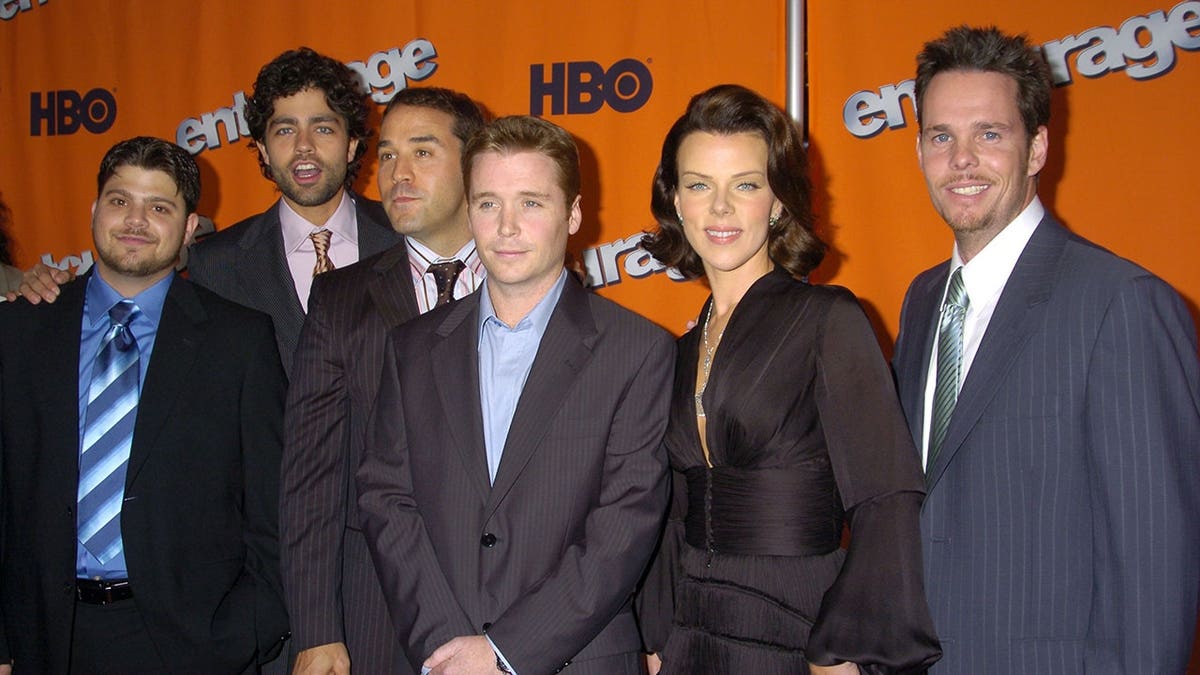 Jerry Ferrara, Adrian Grenier, Jeremy Piven, Kevin Connolly, Debi Mazar and Kevin Dillon stand together at an event.
