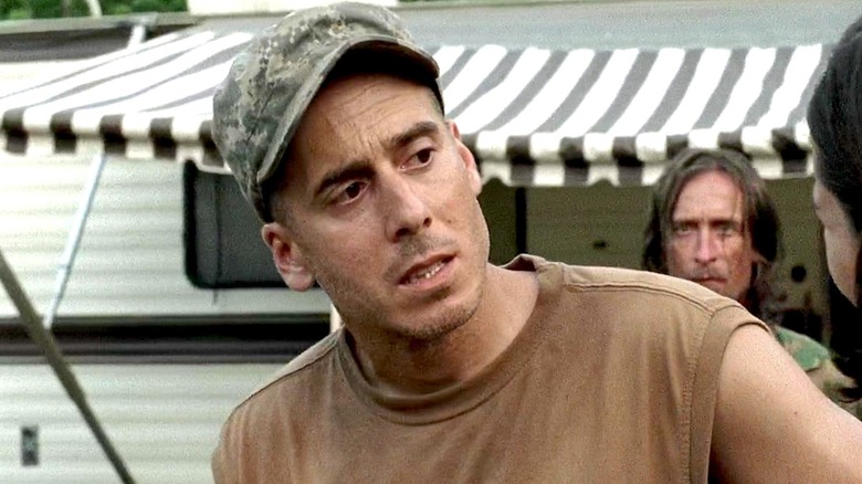 Mitch Dolgen wearing a hat standing outside