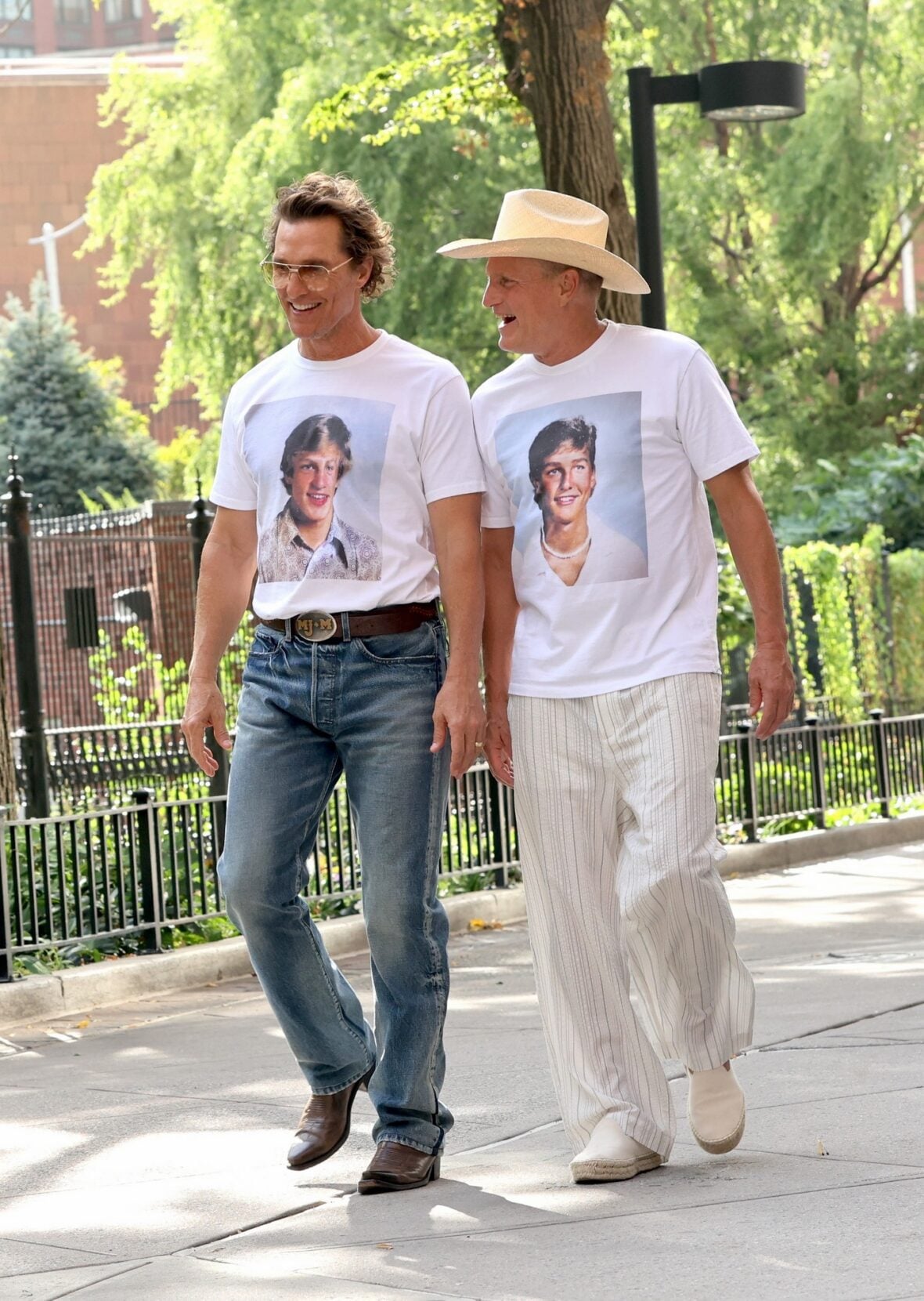 Woody Harrelson and Matthew McConaughey wear shirts with their younger selves on them