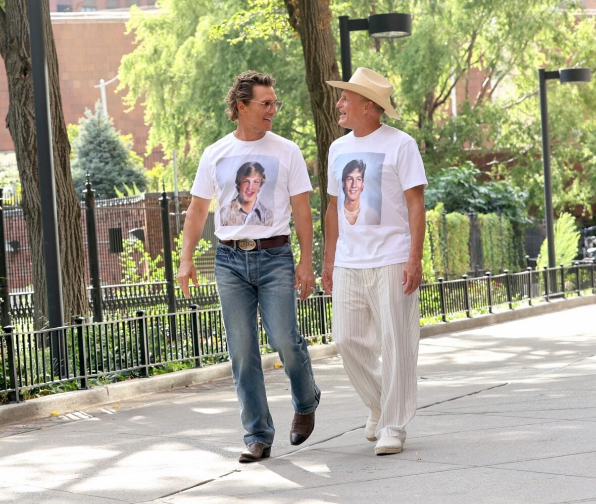 Woody Harrelson and Matthew McConaughey wear shirts with their younger selves on them
