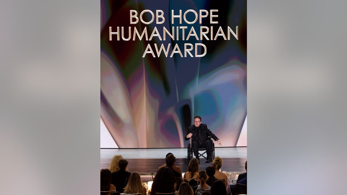Michael J. Fox accepts the Bob Hope Humanitarian Award on stage at the Peacock Theater.