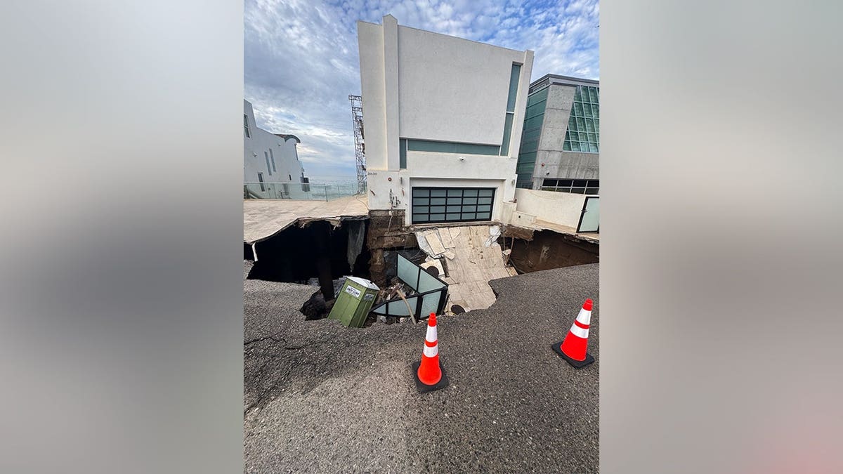 A photo of a sinkhole outside of Nicolas Cage's home in Malibu in September 2026.
