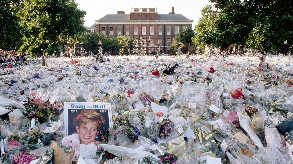 A multi-colored sea of floral tributes outside the gates of Princess Diana's London home