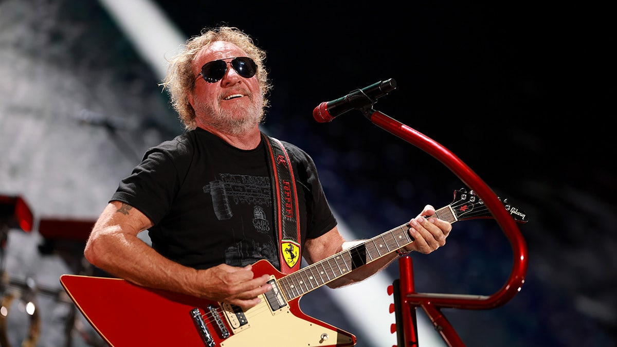 Sammy Hagar playing guitar and performing in September 0225