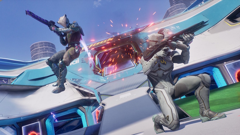 Two players under fire aim futuristic weapons in Splitgate: Arena Reloaded