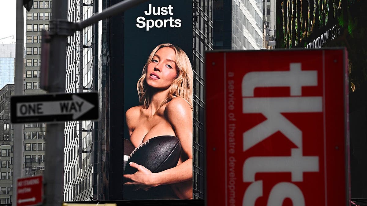 Sydney Sweeney poses nude on a Novig billboard in Times Square, New York.