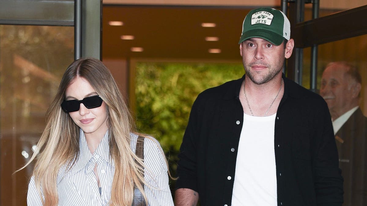 Sydney Sweeney and Scooter Braun walking in Midtown New York City