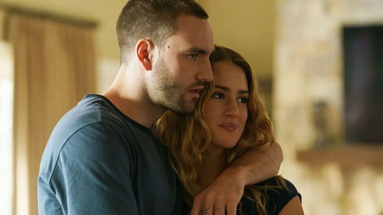 Jackson White and Grace Van Patten as Stephen and Lucy, hugging in "Tell Me Lies."