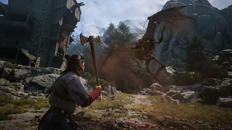 Coen fighting winged creature with an axe in The Blood of the Dawnwalker