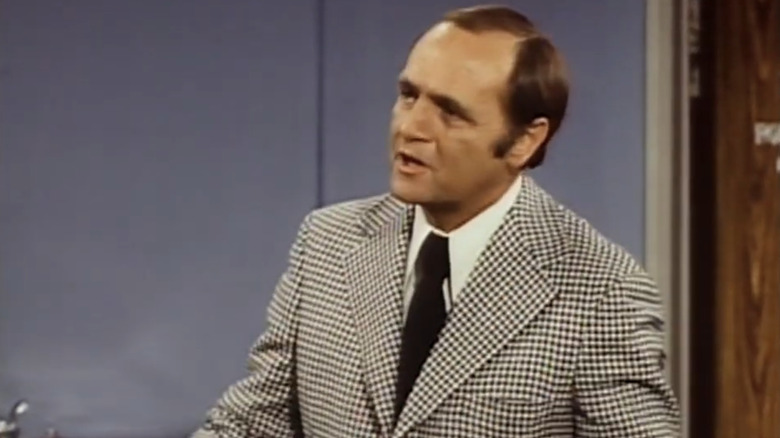 Bob Newhart as Dr. Robert Hartley talks in a room on The Bob Newhart Show