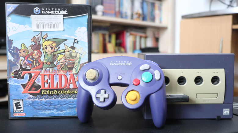 Windwaker copy next to an Indigo Nintendo GameCube and controller