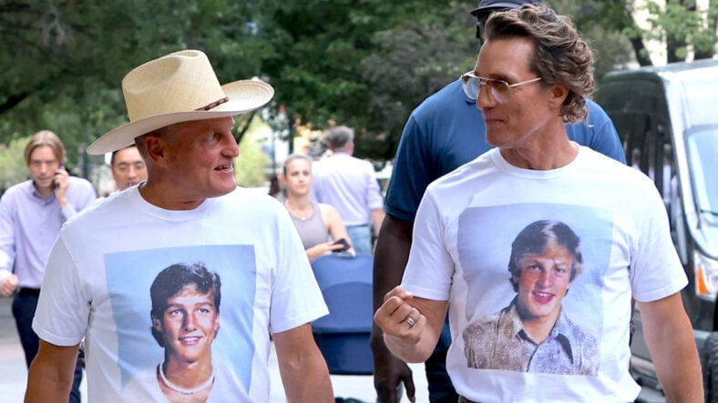 Woody Harrelson and Matthew McConaughey wear shirts with their younger selves on them