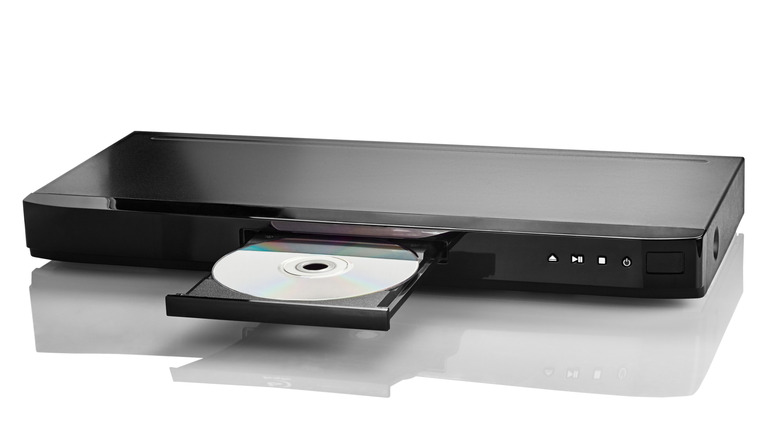A blu-ray player with an open tray on a white background.