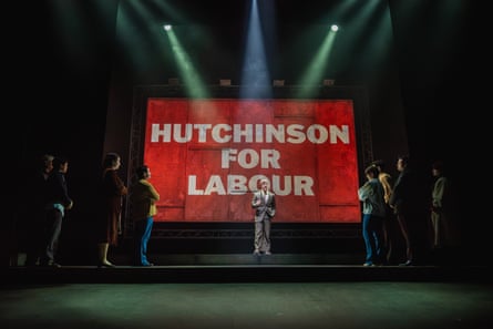In Our Friends in the North, an actor stands under a spotlight before a large sign that reads ‘Hutchinson for Labour’