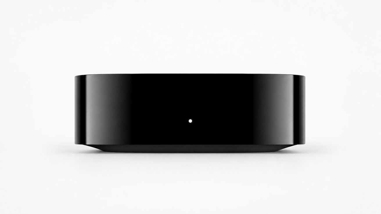 Sleek black rectangular media box on a white background, front view, with a single small white indicator light in the center of its glossy surface