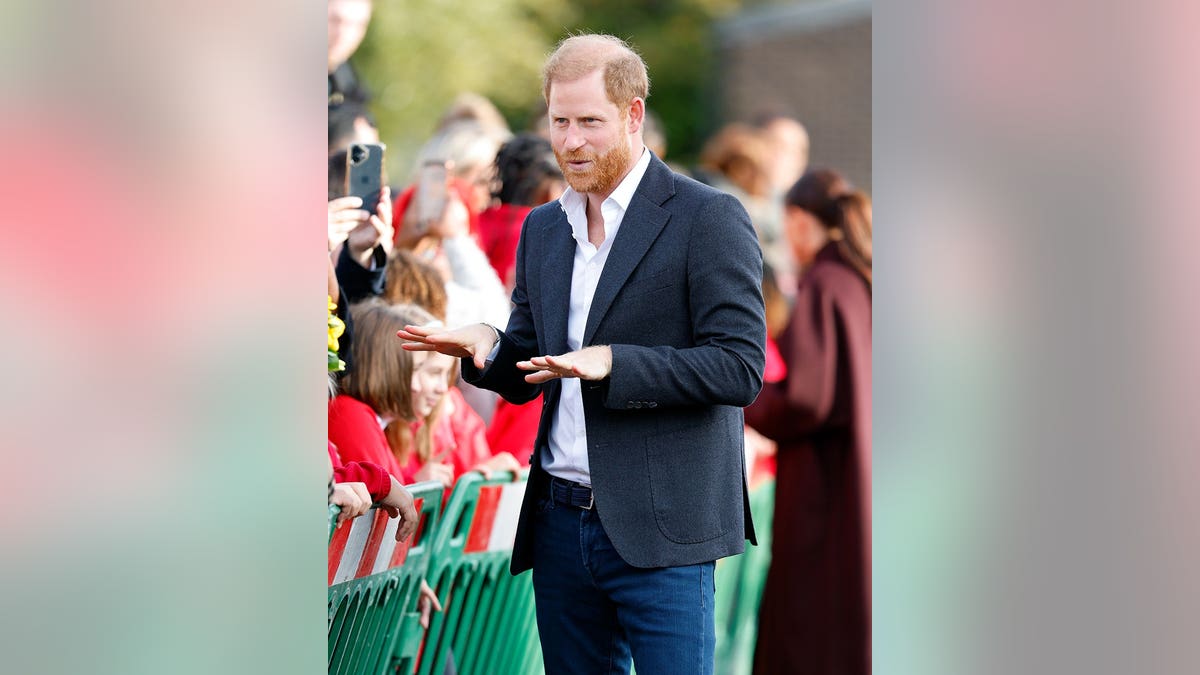 Prince Harry meets members of the public outside The Community Recording Studio in Nottingham, England.