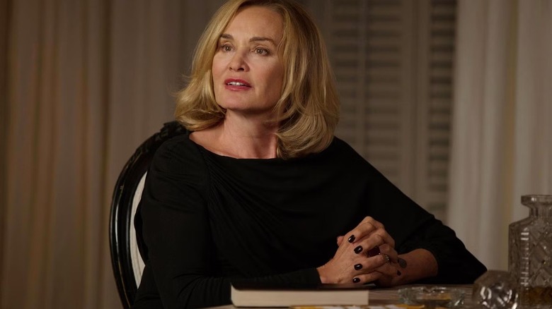 Fiona Goode sitting at a table in "American Horror Story: Coven"