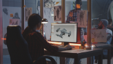 A woman rendering an airplane at her desktop computer