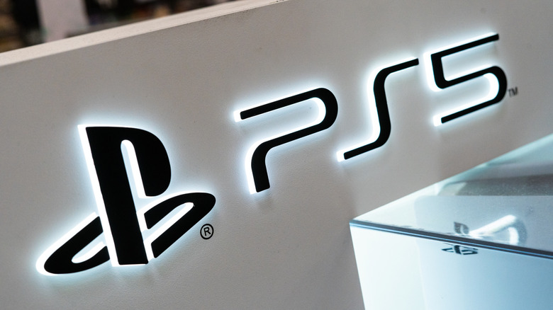 PS5 Logo in neon lights on a white wall decoration