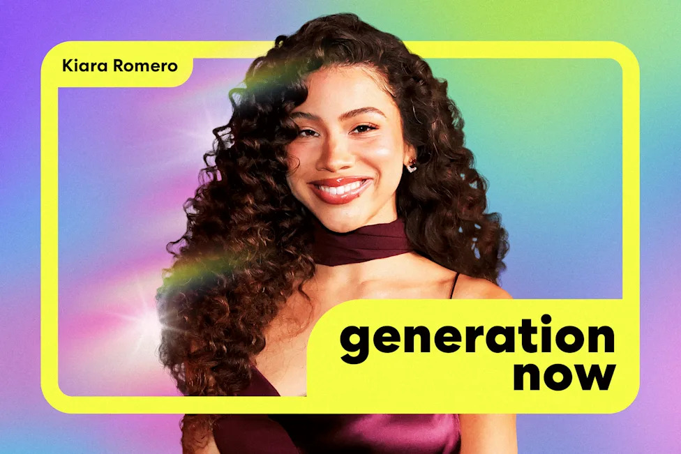 Kiara Romero smiles with her long, dark curls loose, wearing a burgundy outfit against a colorful background with a yellow frame and the words "Kiara Romero" and "Generation Now."