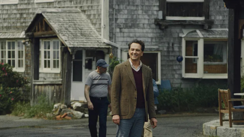 Tom Loftis smiling outside