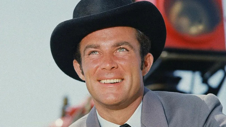 James T. West standing in front of a train in "The Wild Wild West" (1965)
